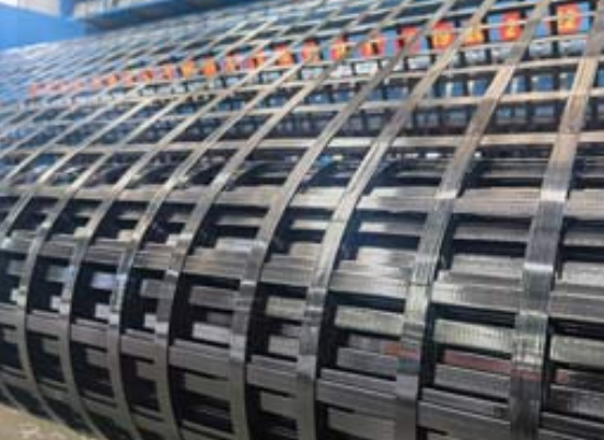 华池钢塑土工格栅：基建“隐形脊梁”的绿色智造与长寿命进化论